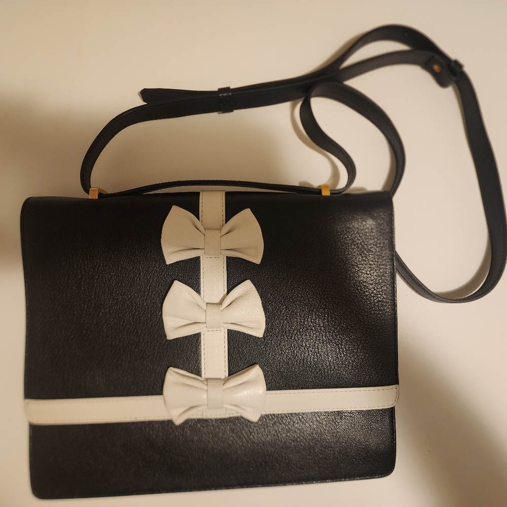 Boutique Moschino leather black bag with white bows